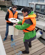 Immersing the first drifter in the Southampton Water